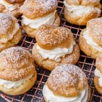 overhead view of whipped cream filled cream puffs