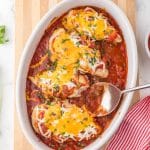 overhead view of baked salsa chicken in a serving dish