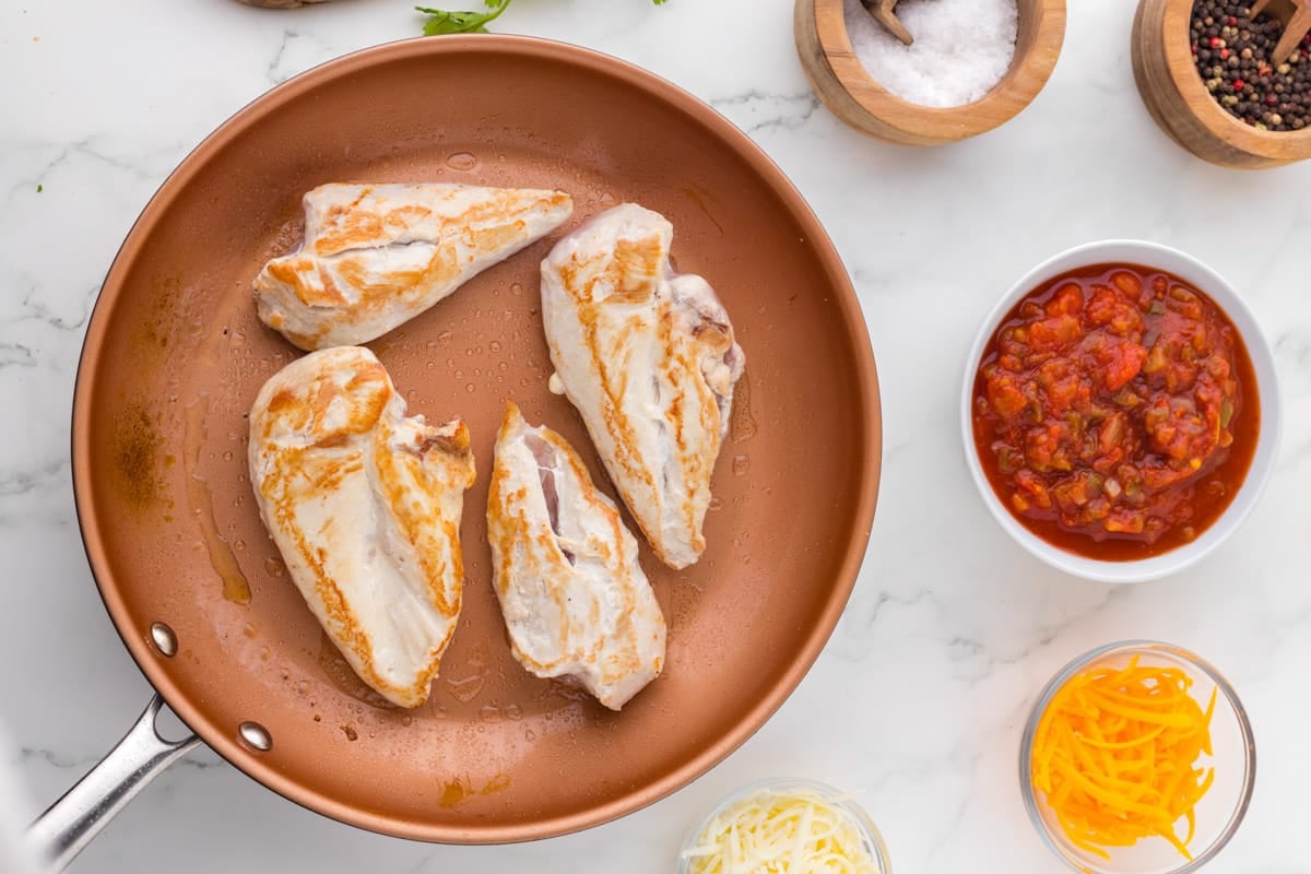 seared chicken in a frying pan