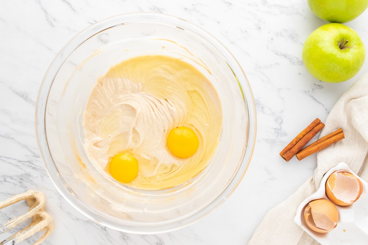 eggs over smooth cream cheese in a bowl