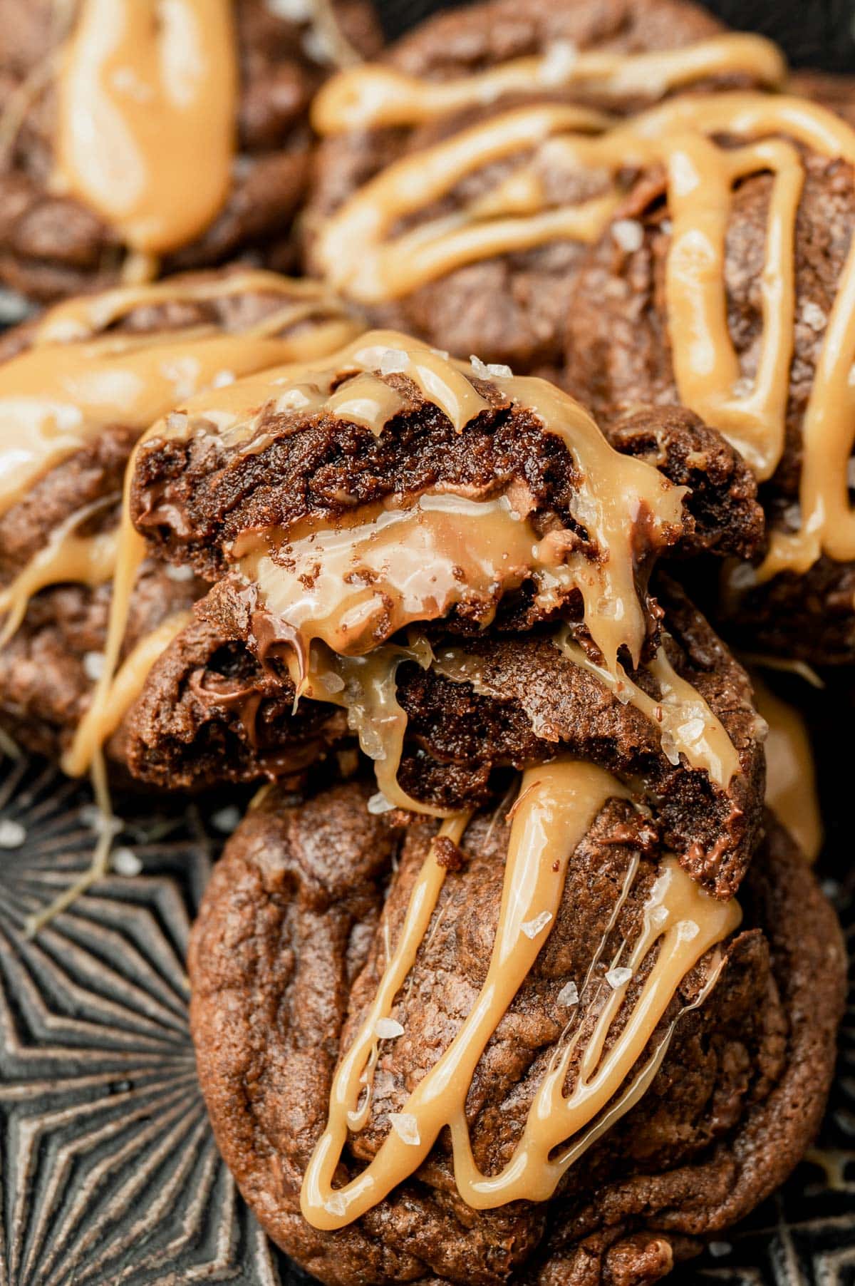 a double chocolate cookie broken in half