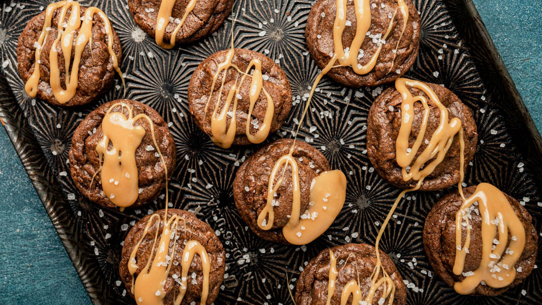 double chocolate caramel cookies on a baking sheet