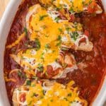 overhead view of baked chicken breasts in a dish