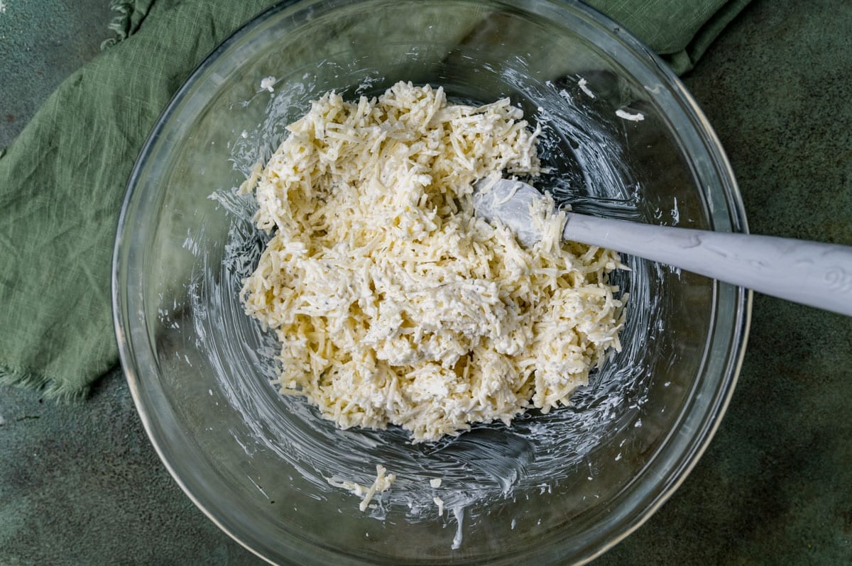 sour cream and cheese mixture in a glass bowl