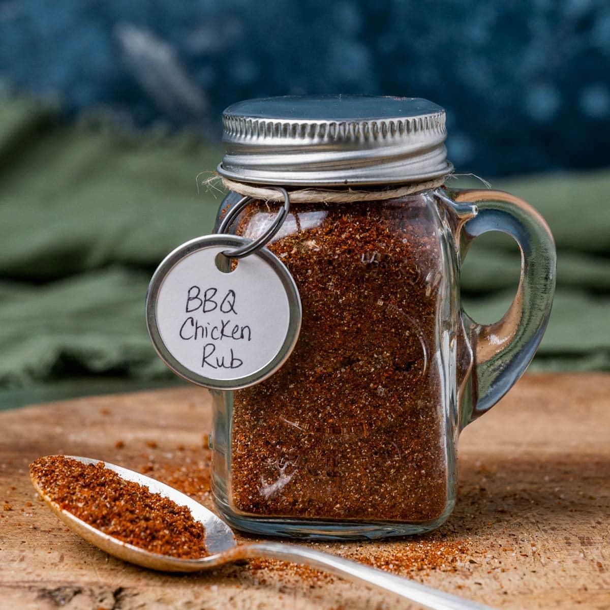 bbq chicken rub in a glass jar