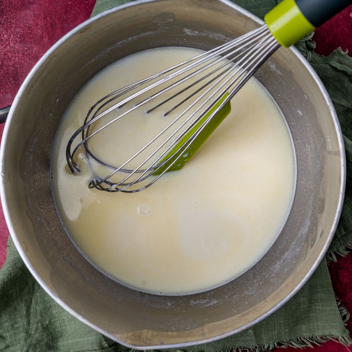 whisked milk and butter in a saucepan