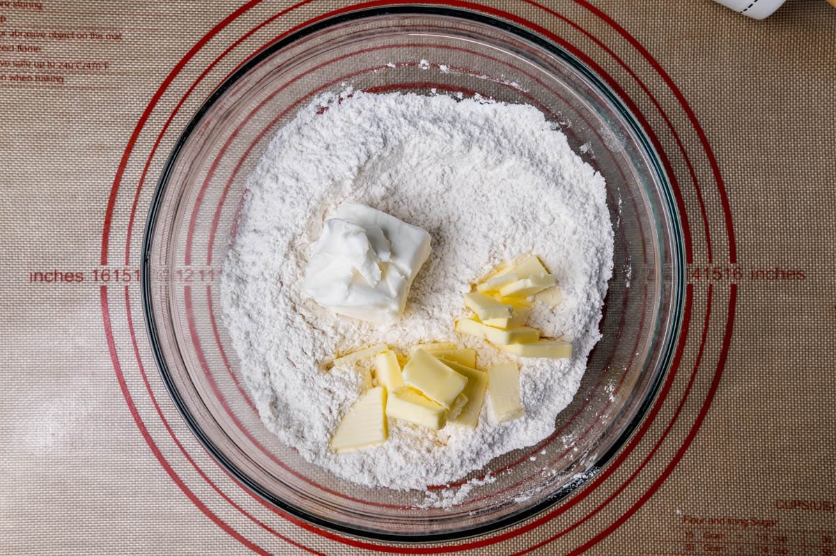 flour, butter and shortening in a mixing bowl