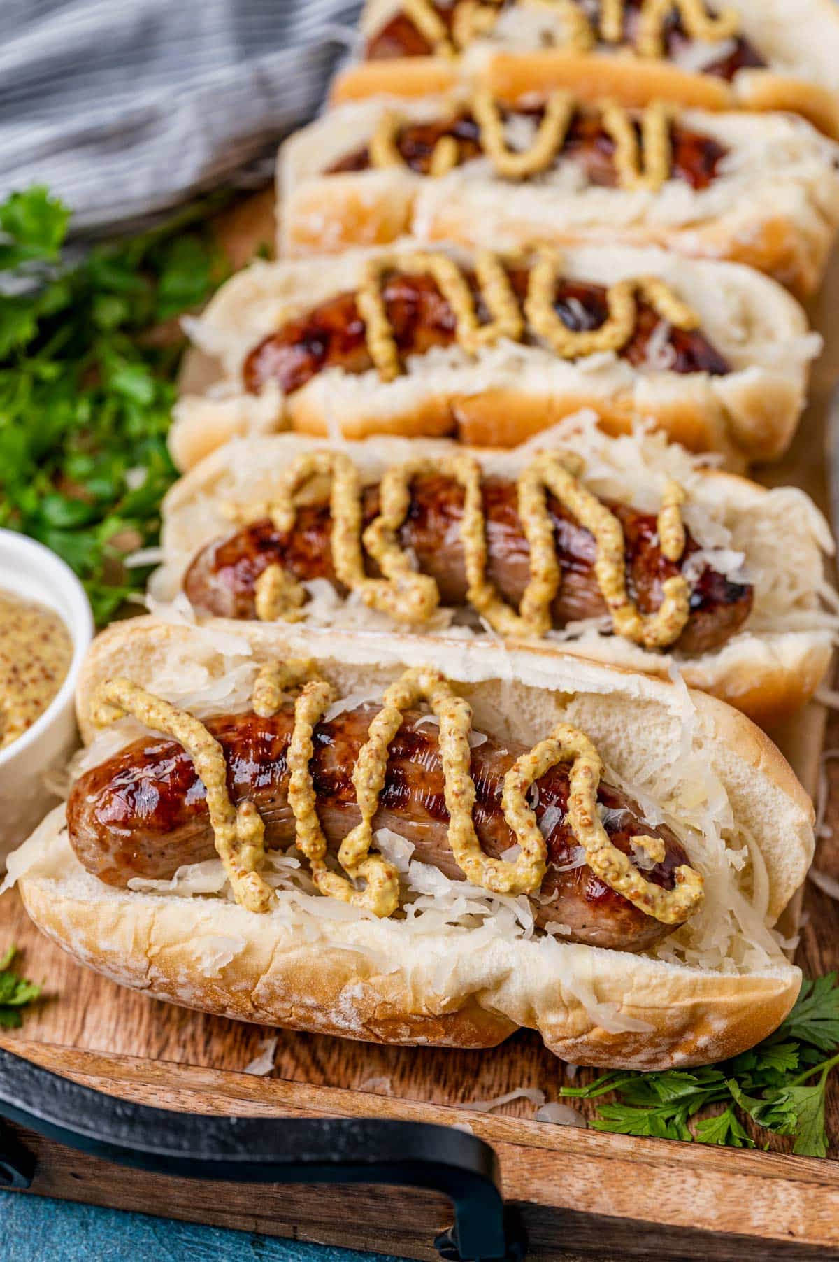sauerkraut and bratwurst sandwiches with brown mustard