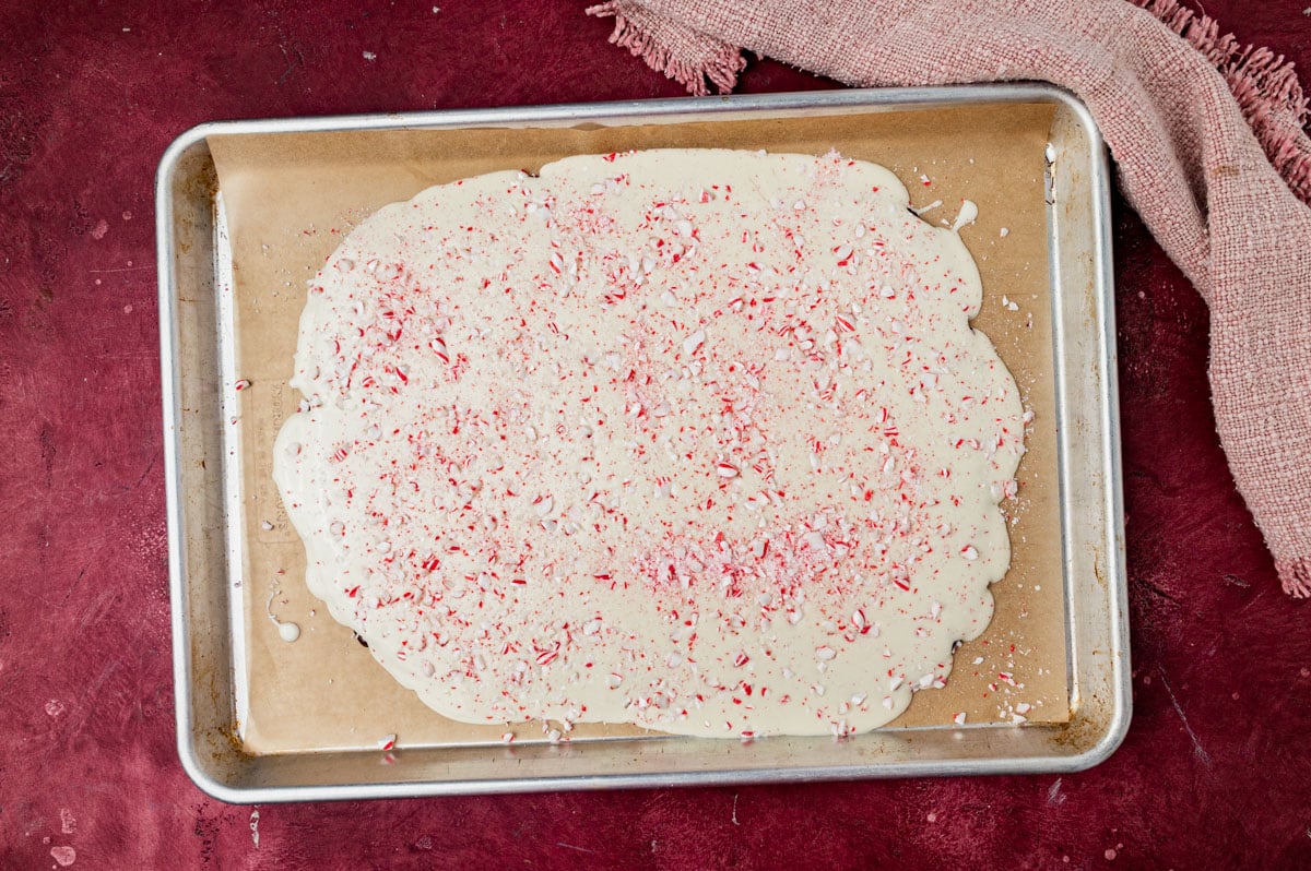 uncut peppermint bark on a baking sheet