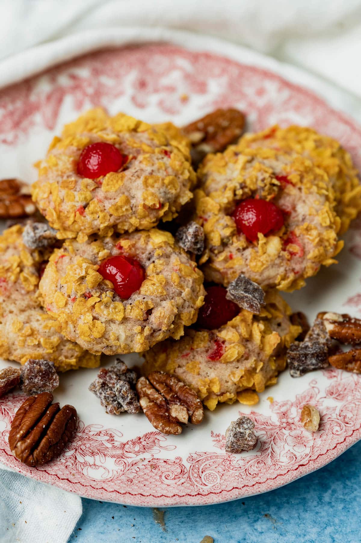 a plate of cherry winks cornflake cookies