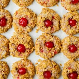 overhead view of cornflake cookies with cherries