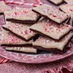 pieces of white chocolate peppermint bark on a plate