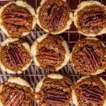 overhead view of pecan tassies on a wire rack