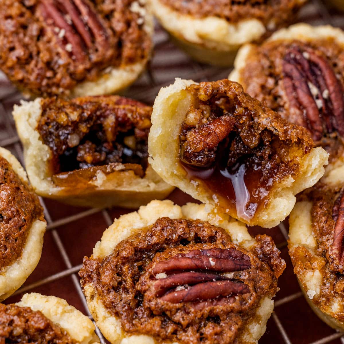 a pecan tassie cookie cut in half