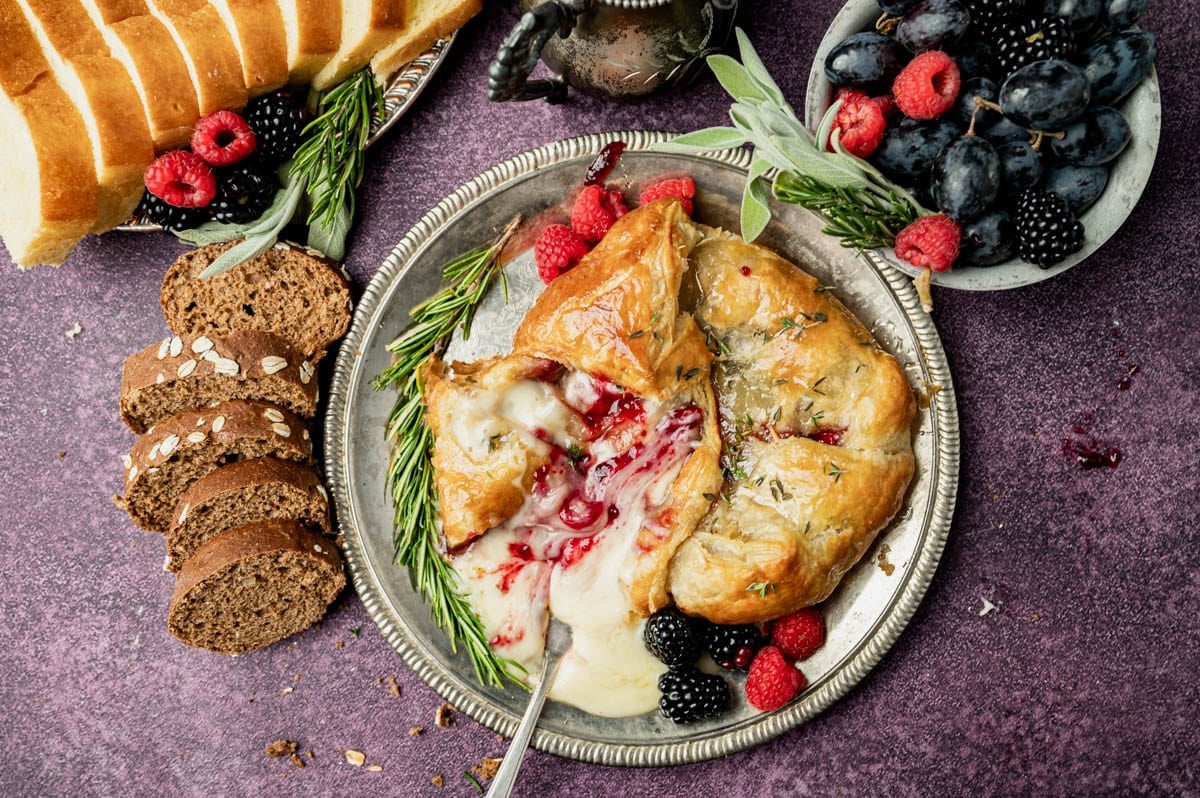 brie with puff pastry and jam on a plate