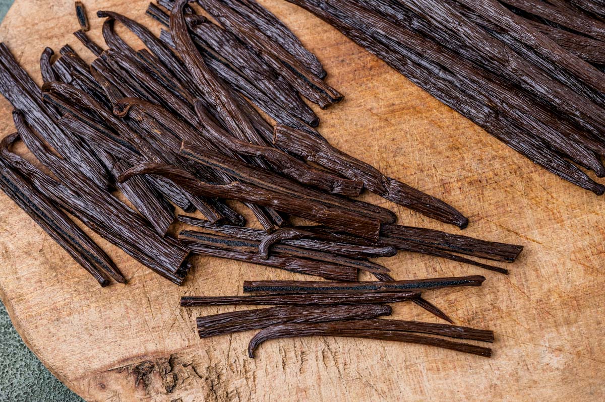 cut vanilla beans on a cutting board