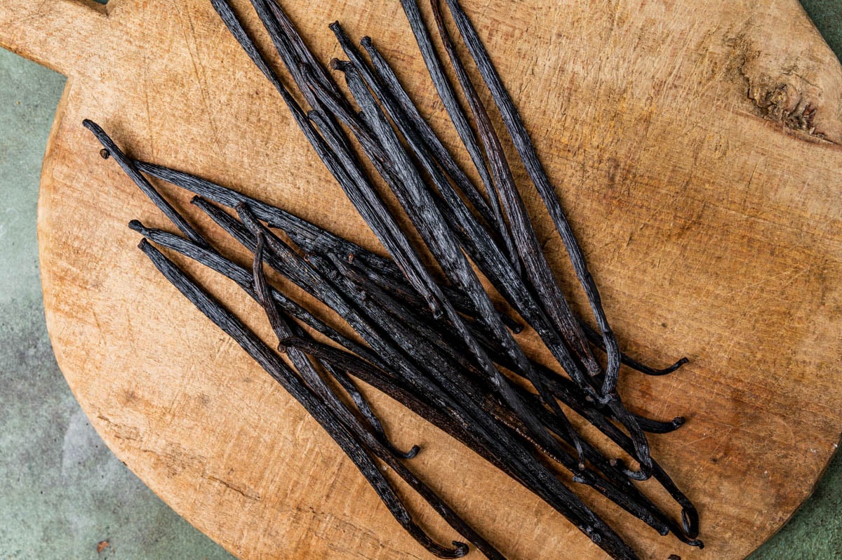 dried vanilla beans on a cutting board