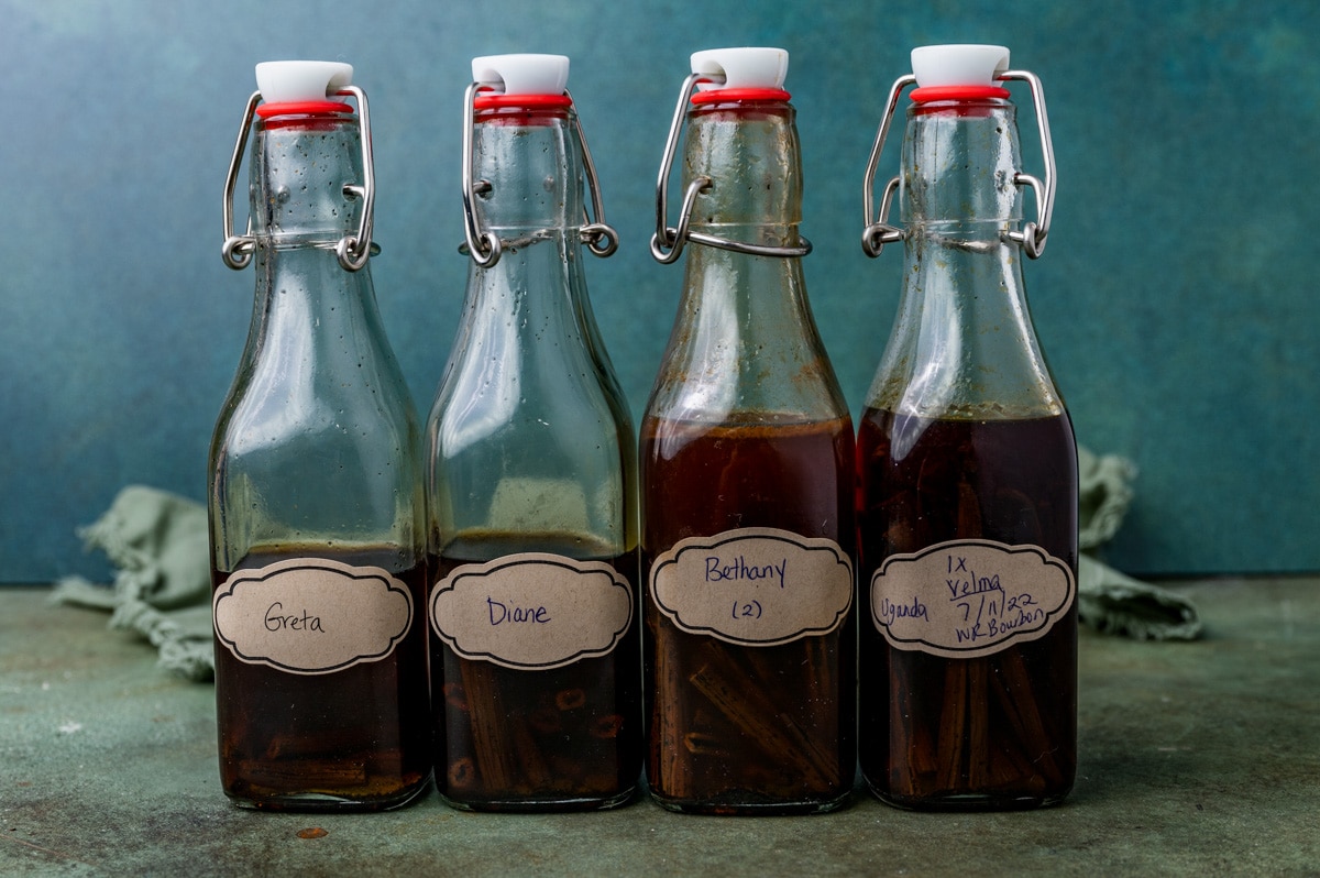 4 glass bottles of homemade vanilla extract