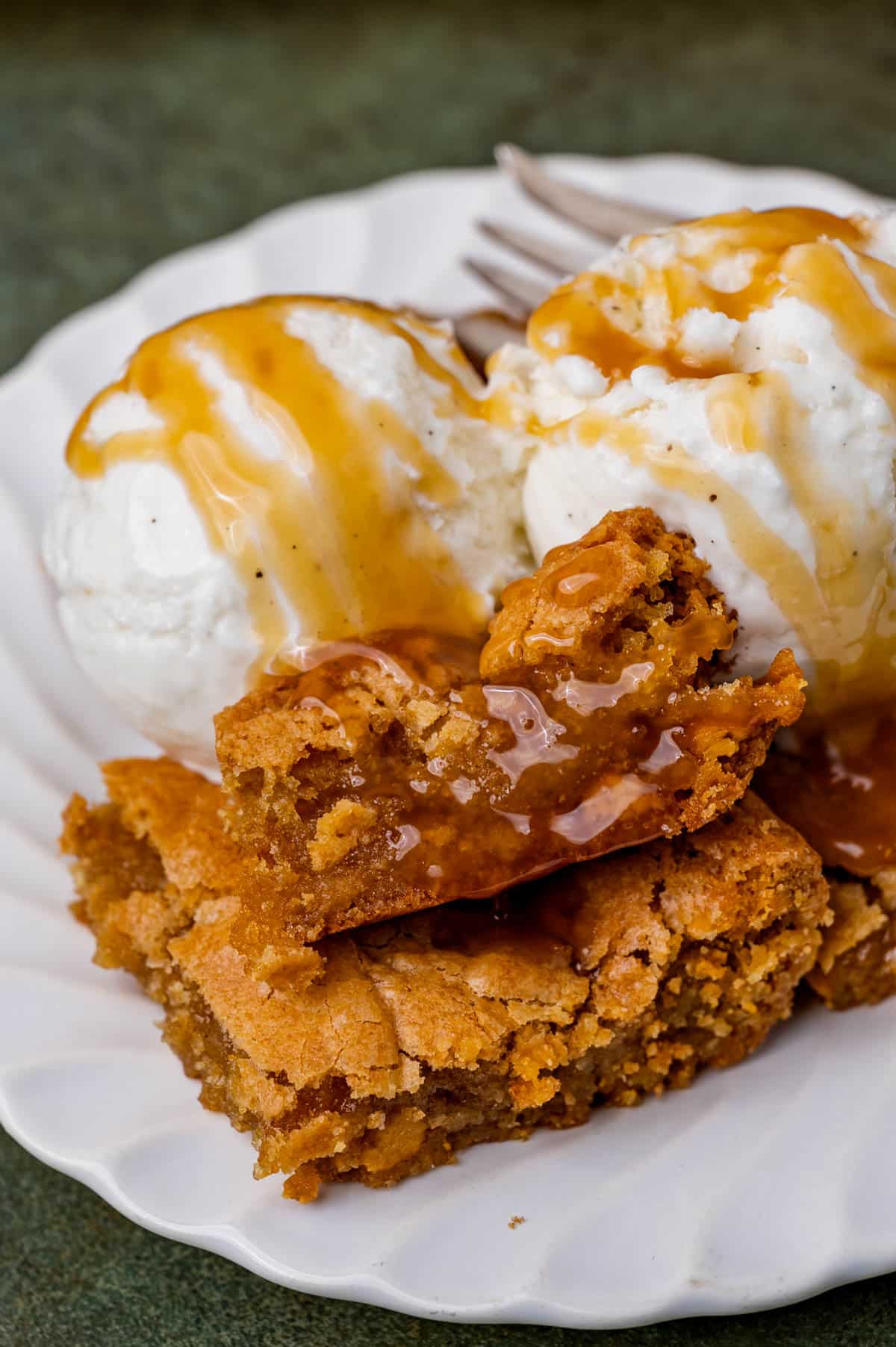 butterscotch cookie bars with ice cream and butterscotch sauce