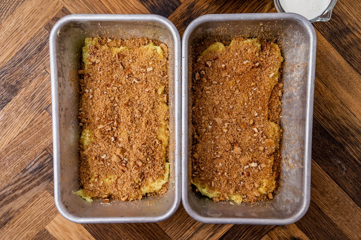 unbaked cinnamon sugar pistachio bread in loaf pans