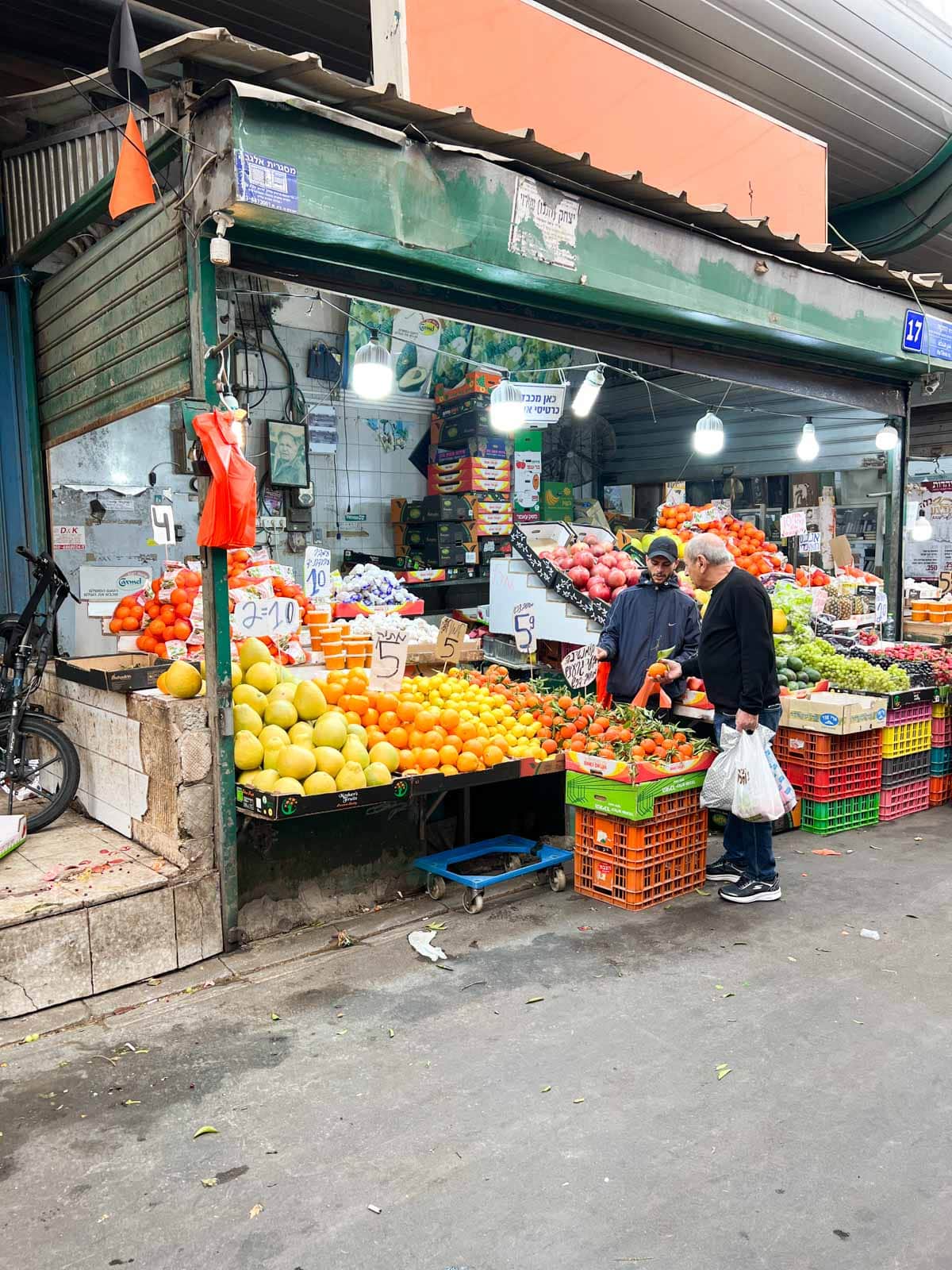 a man shopping at hatikvah market
