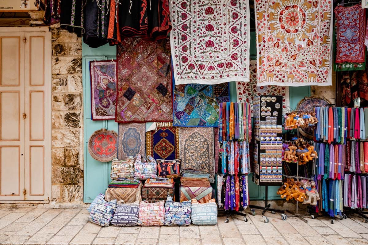 rugs outside a market store