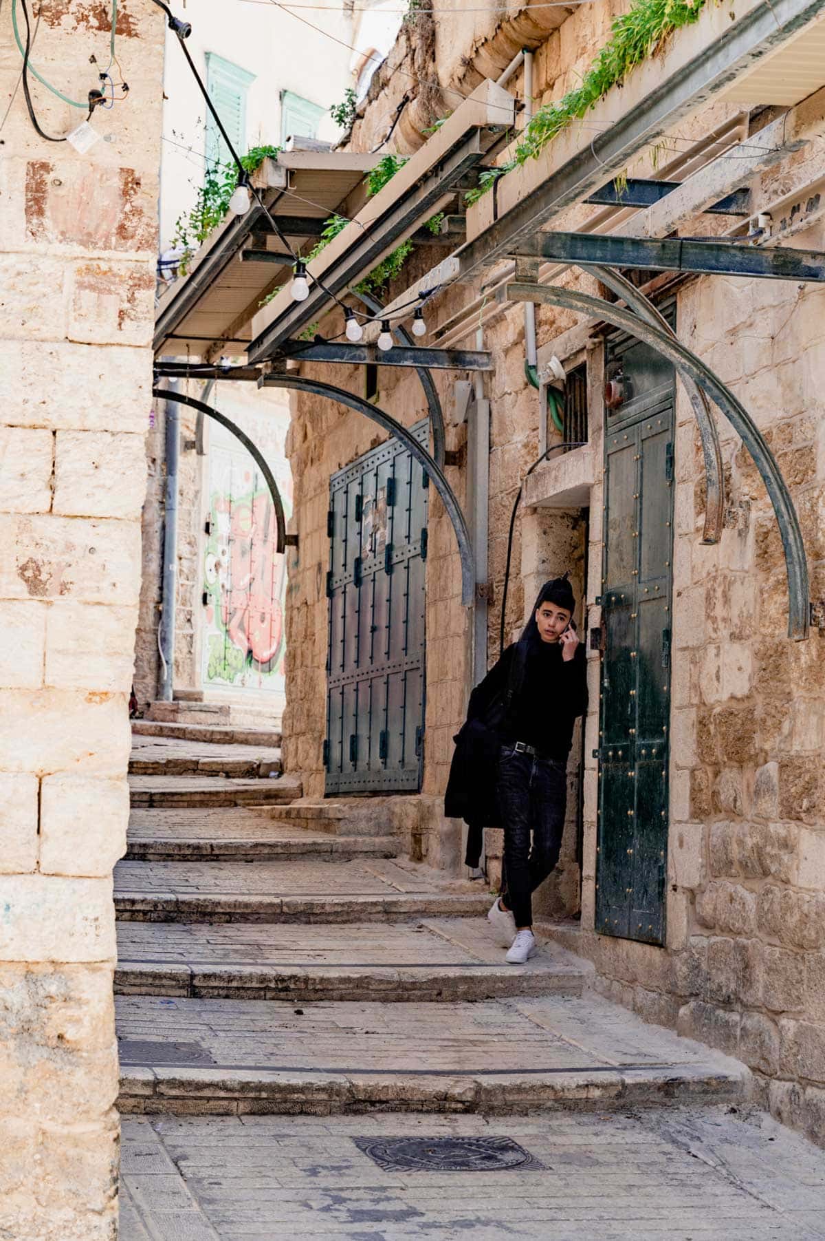 a man standing on a street in Nazareth