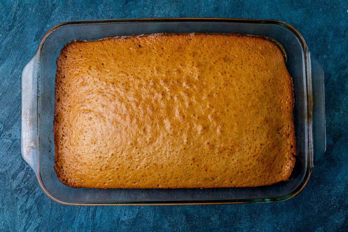 an unfrosted peanut butter cake on a table