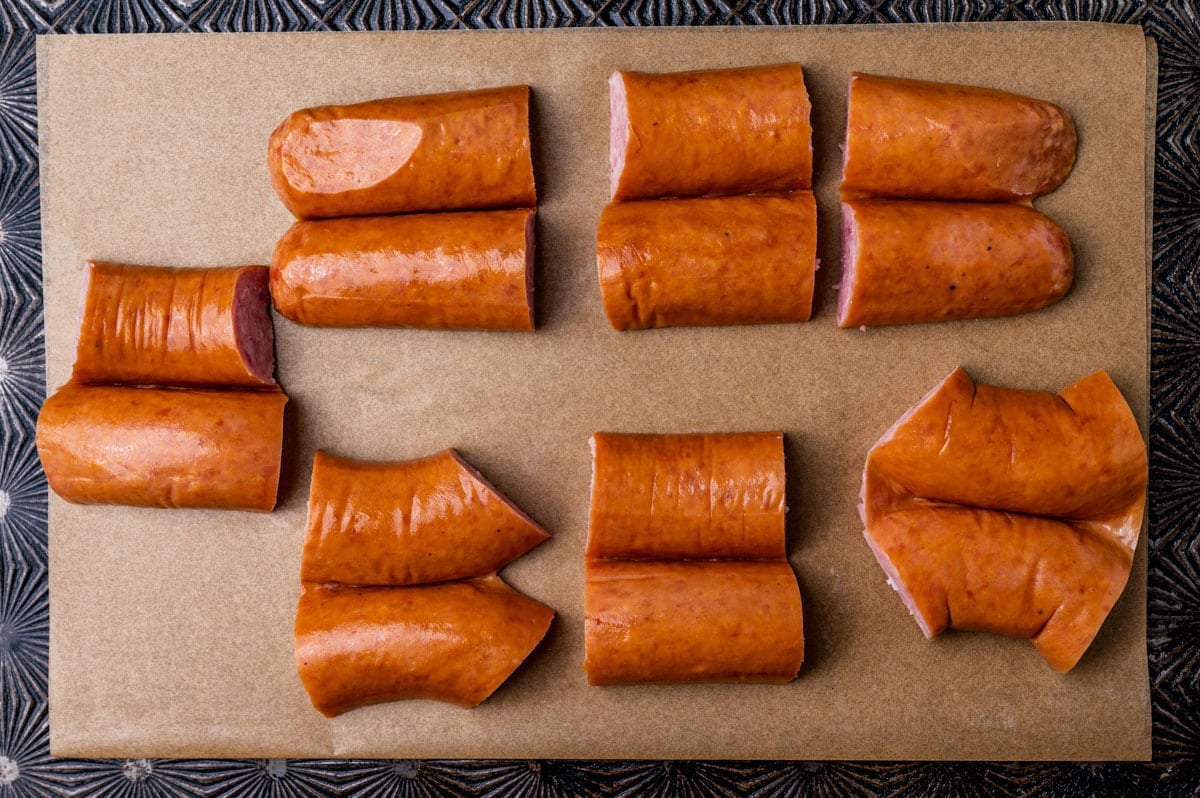 unbaked kielbasa on a baking pan