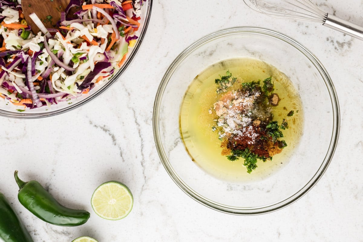 citrus vinaigrette ingredients in a mixing bowl