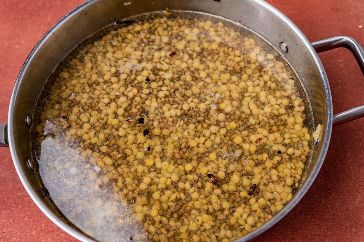 lentils in water in a skillet