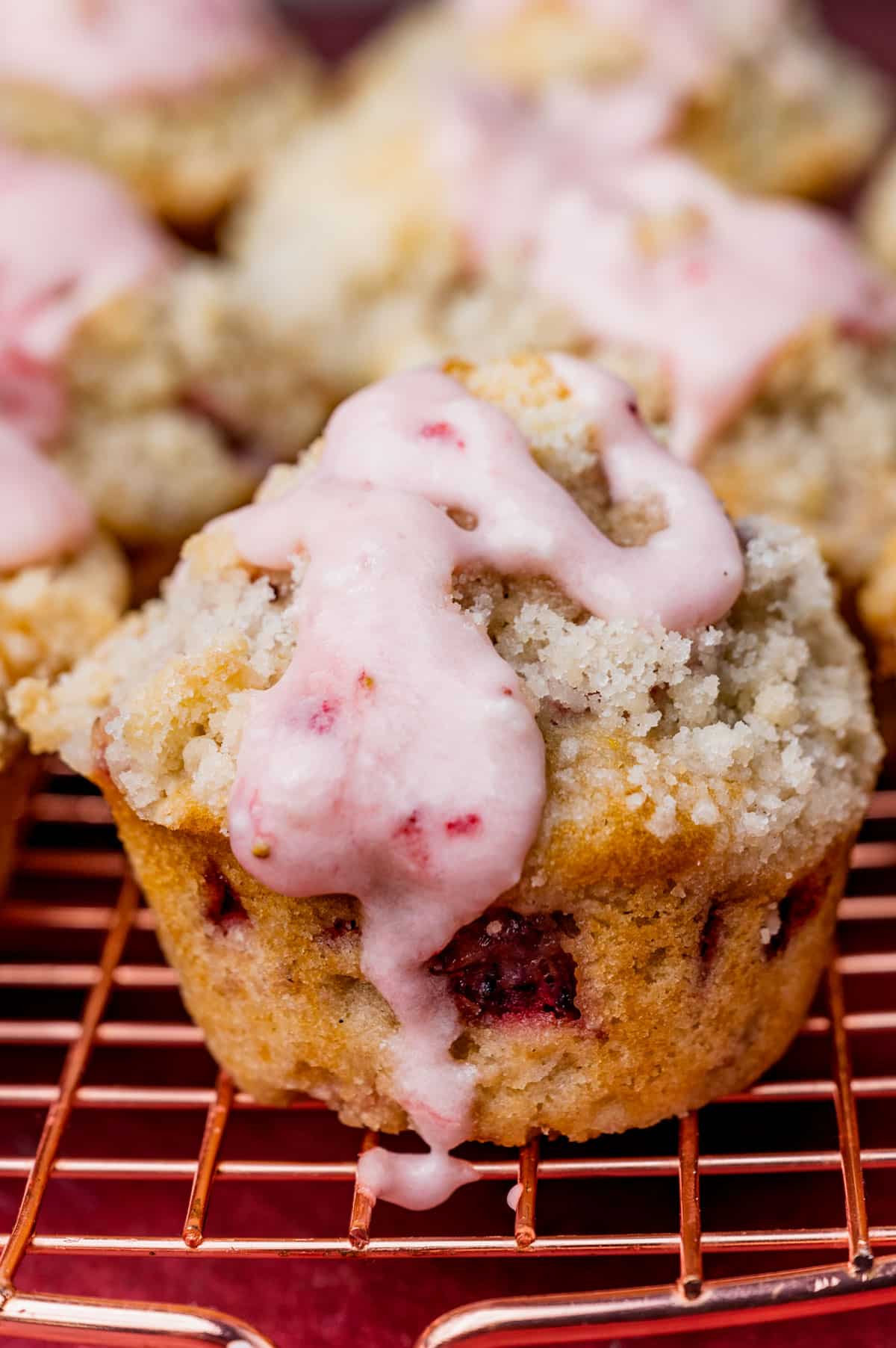 a strawberry muffin with fresh strawberry glaze on top