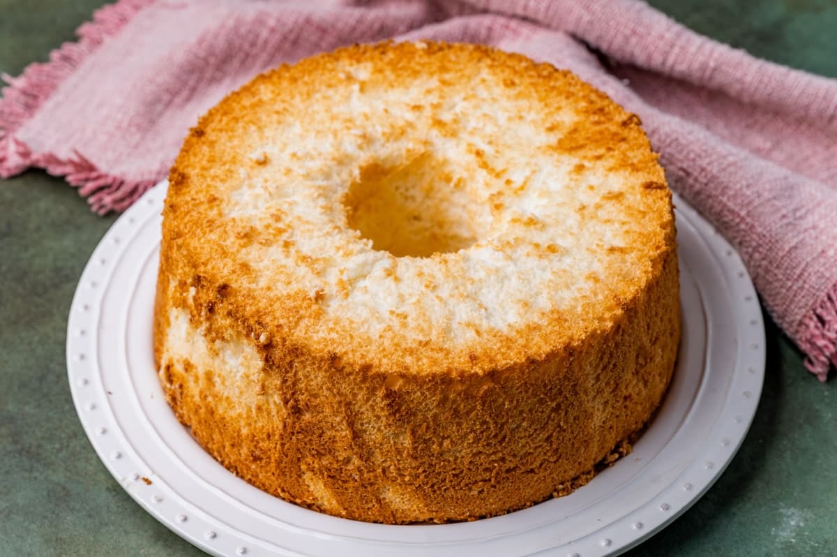 an angel food cake on a cake plate