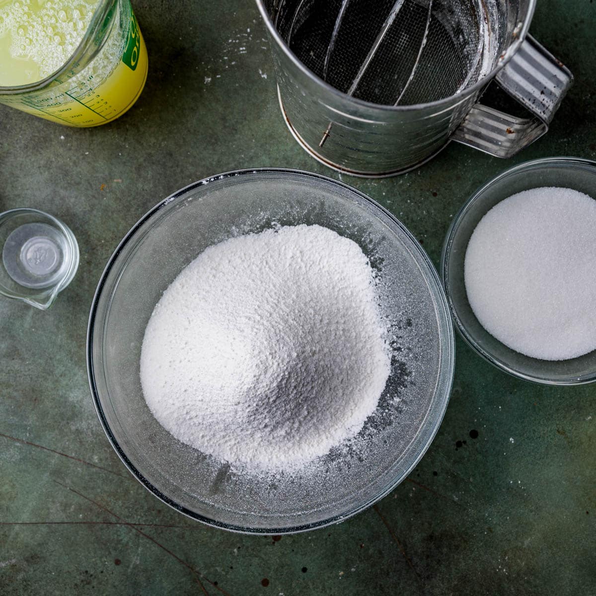 sifted flour and sugar in a glass bowl