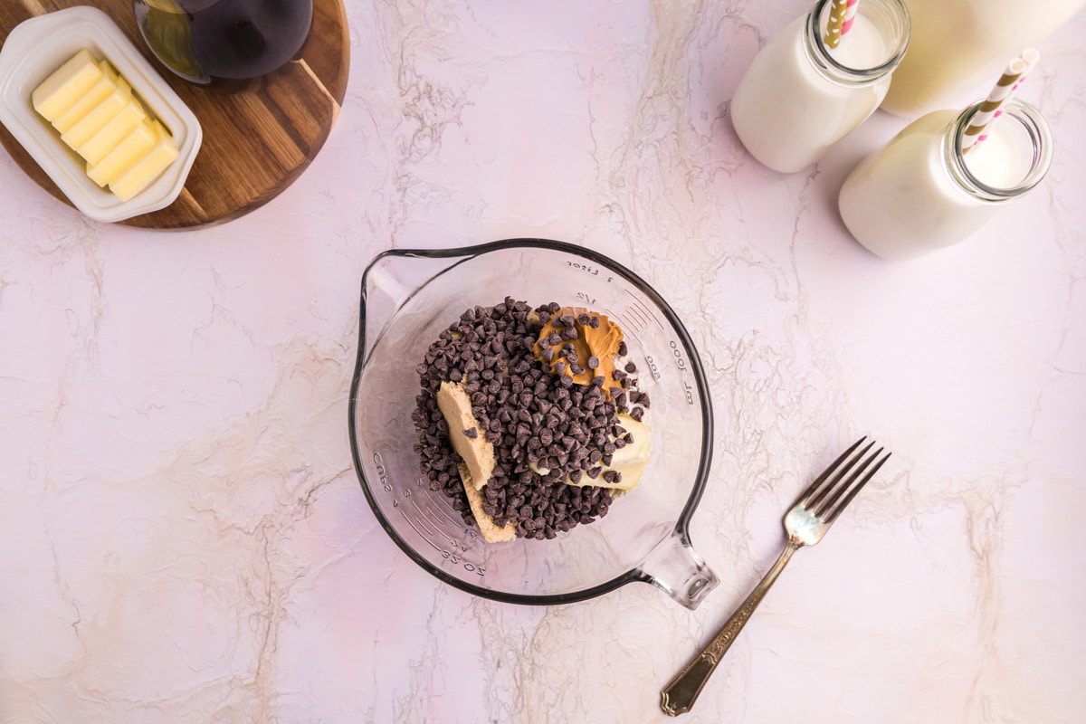 ingredients for chocolate chip peanut butter streusel in a glass bowl