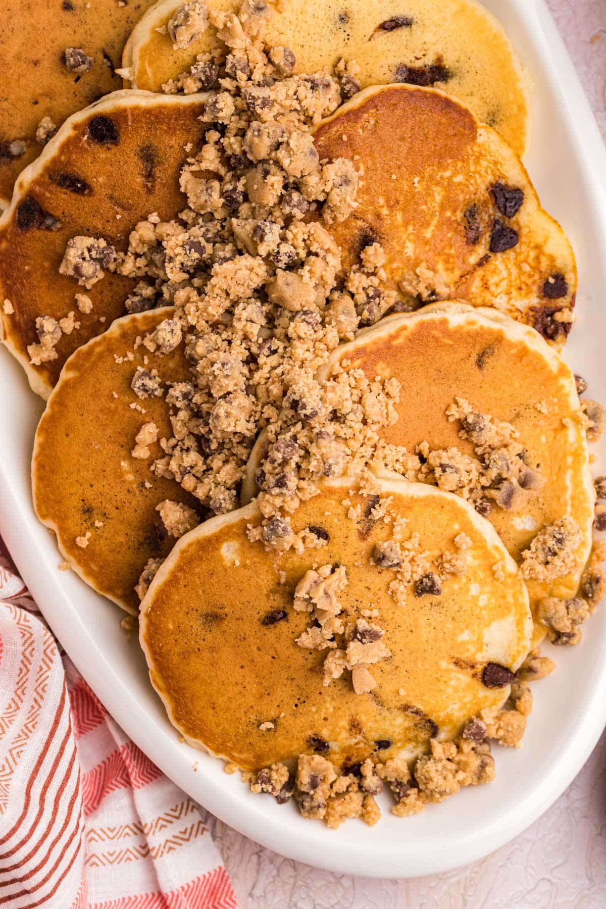 overhead view of chocolate chip pancakes with peanut butter streusel