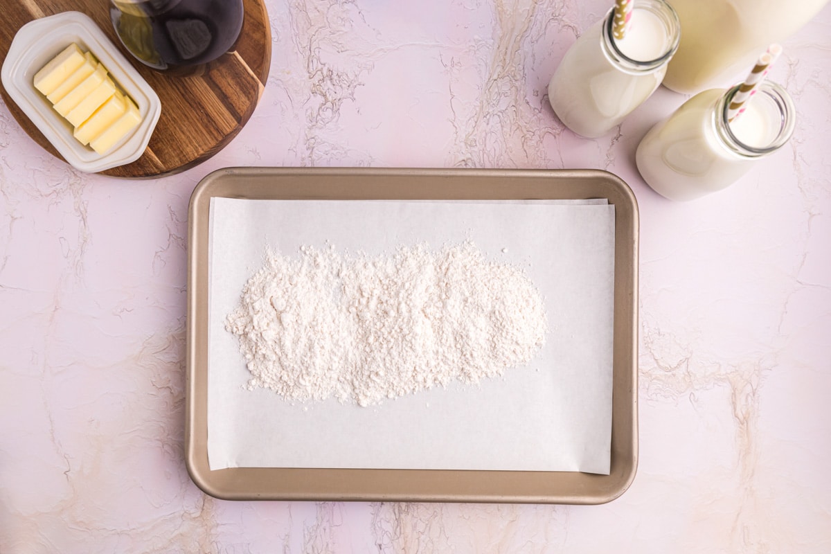 flour on a baking sheet lined with parchment paper