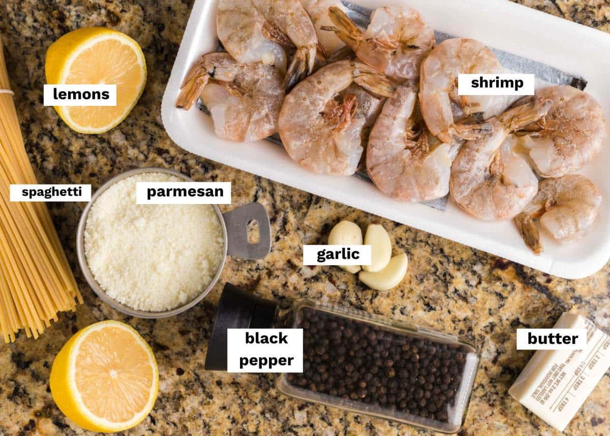 ingredients for shrimp pasta on a table