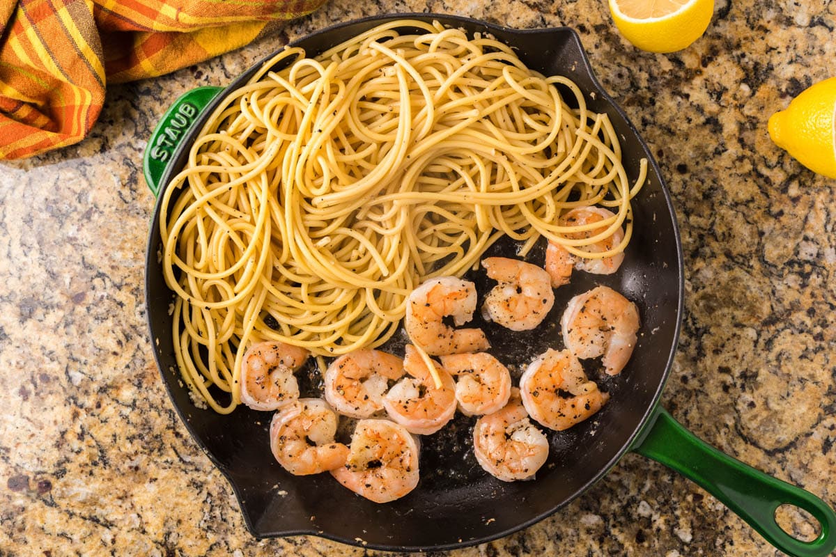 spaghetti and shrimp in a skillet