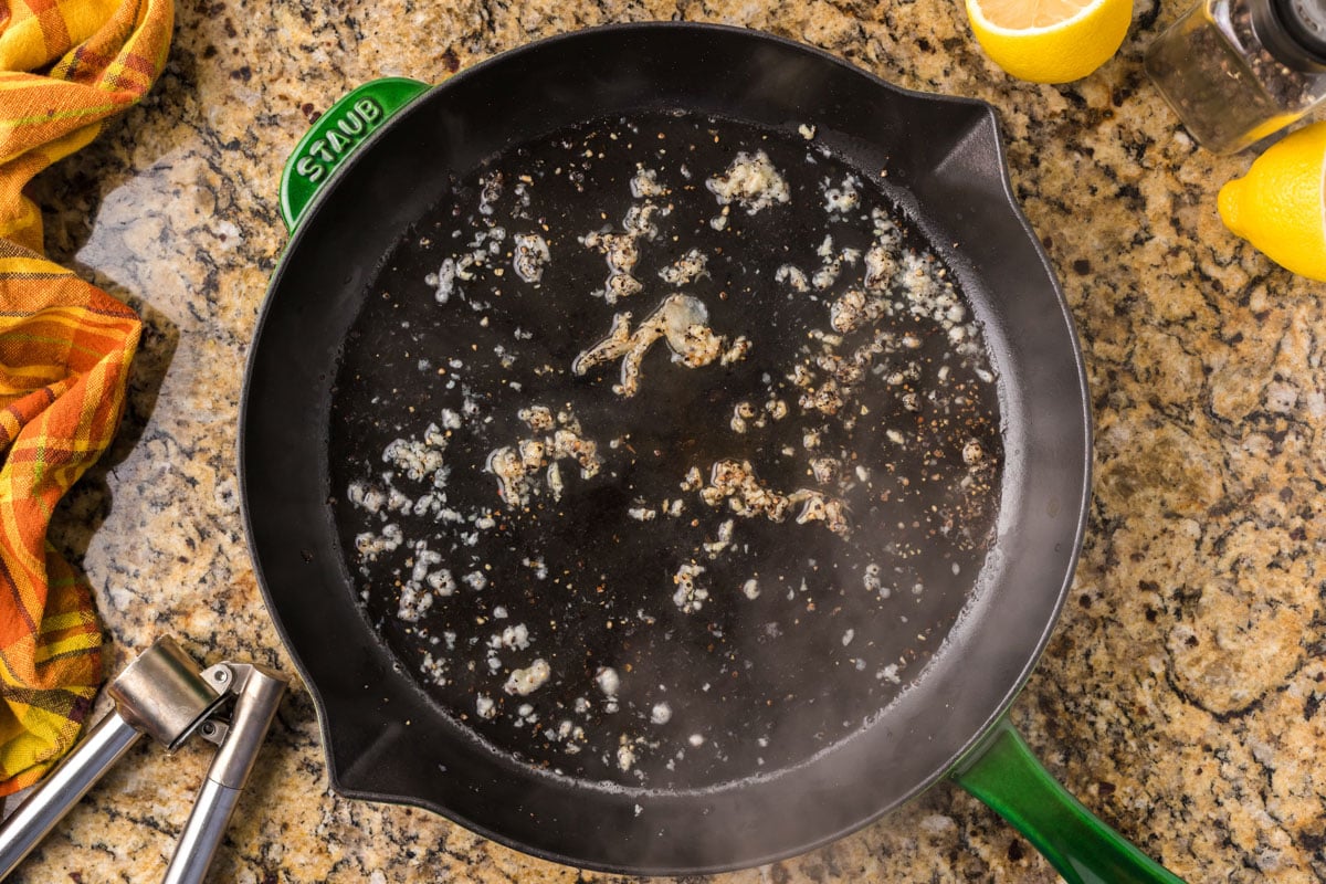 minced garlic sautéed in oil in a skillet