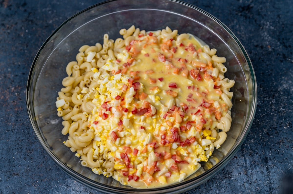 macaroni salad ingredients in a bowl, unmixed
