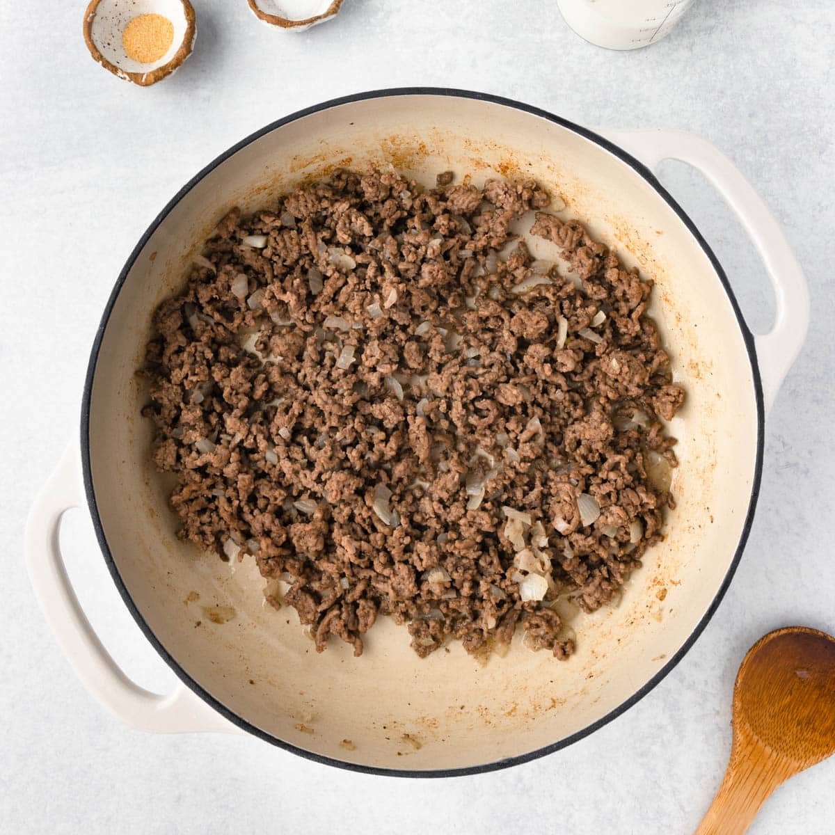 ground beef and onions in a skillet