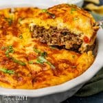 a slice of impossible taco pie on a spatula