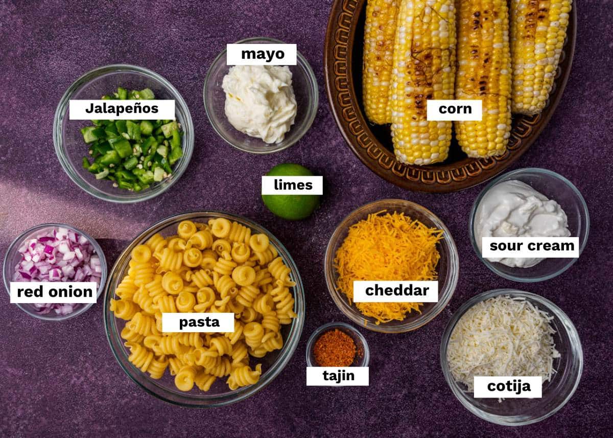 ingredients for mexican street corn pasta salad on a table