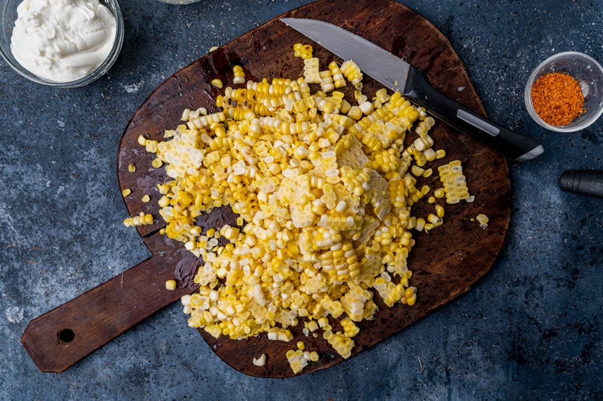 corn kernels on a cutting board