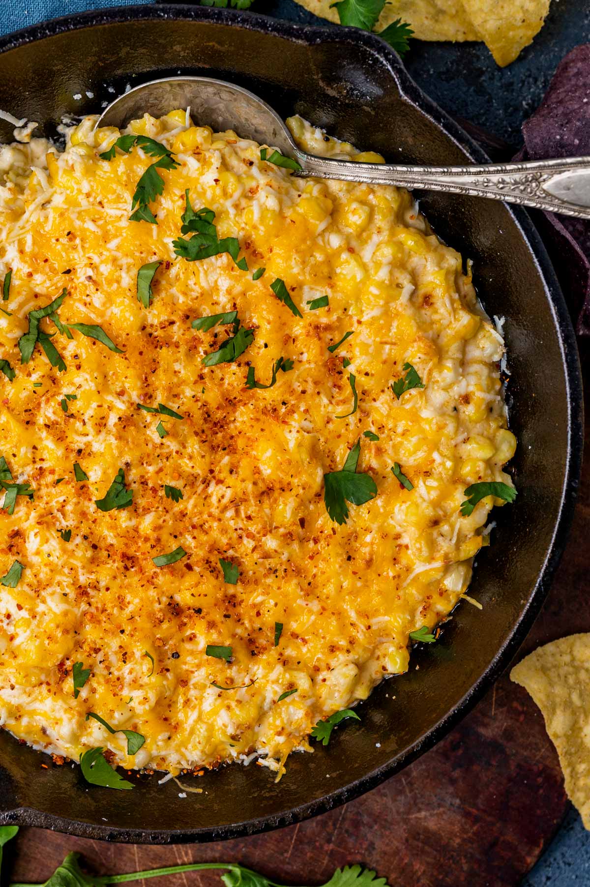 overhead view of mexican street corn dip with a spoon