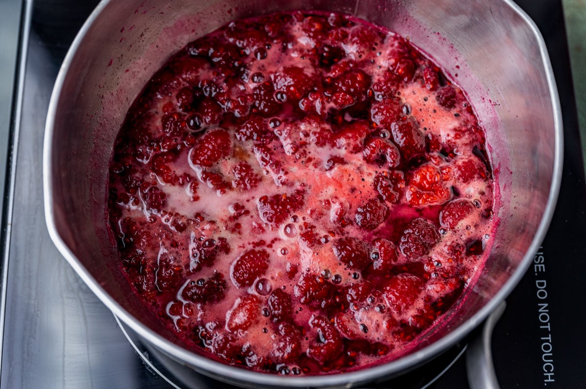 raspberries boiling on a stovetop