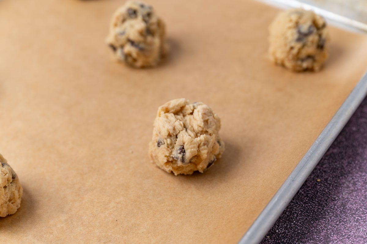 cookie dough sitting on a baking sheet