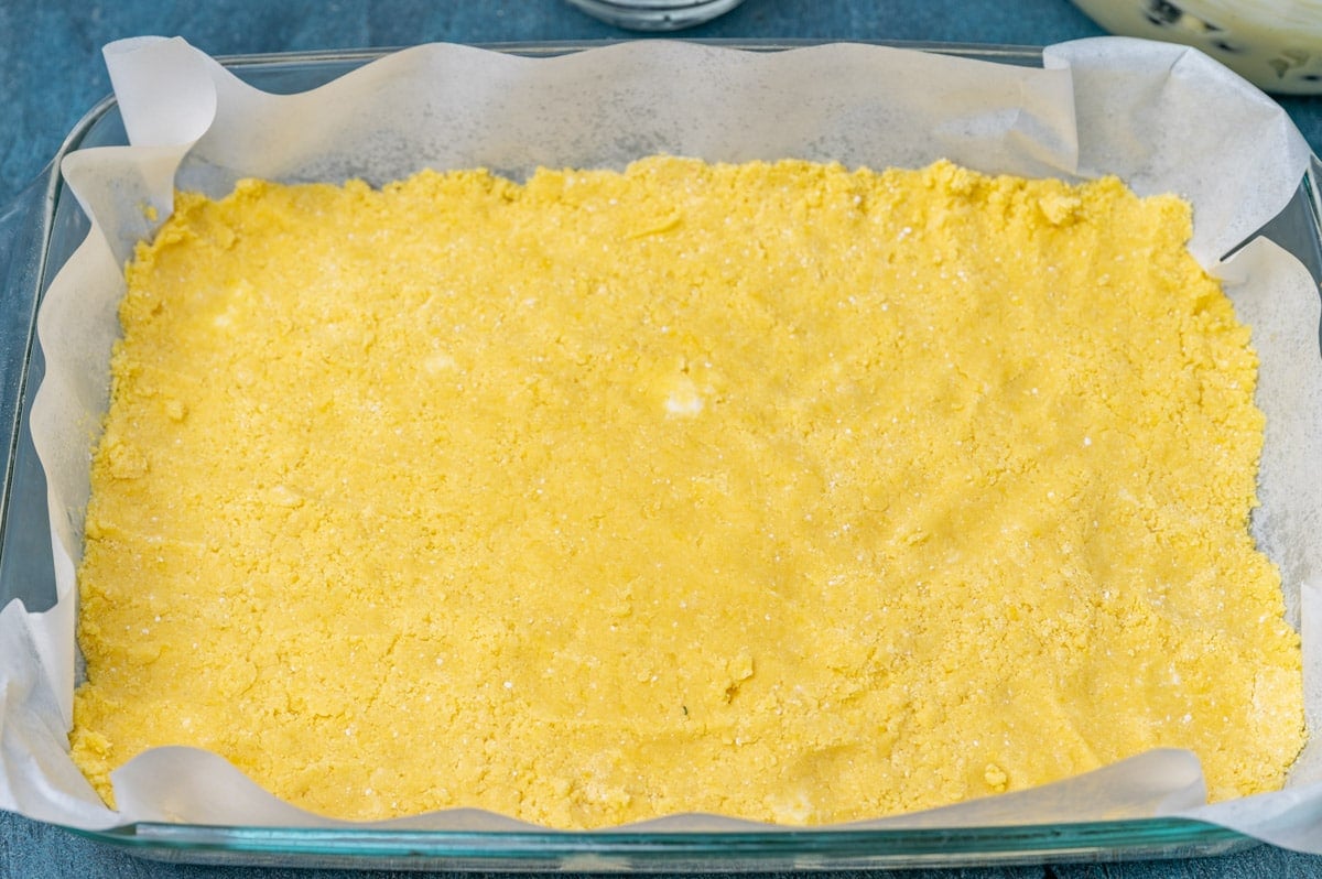 unbaked cake mix crust in a baking pan