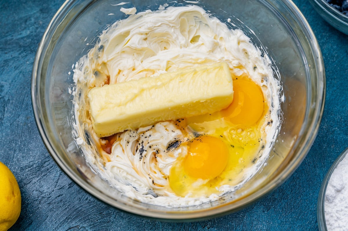 butter, eggs, cream cheese and vanilla in a mixing bowl
